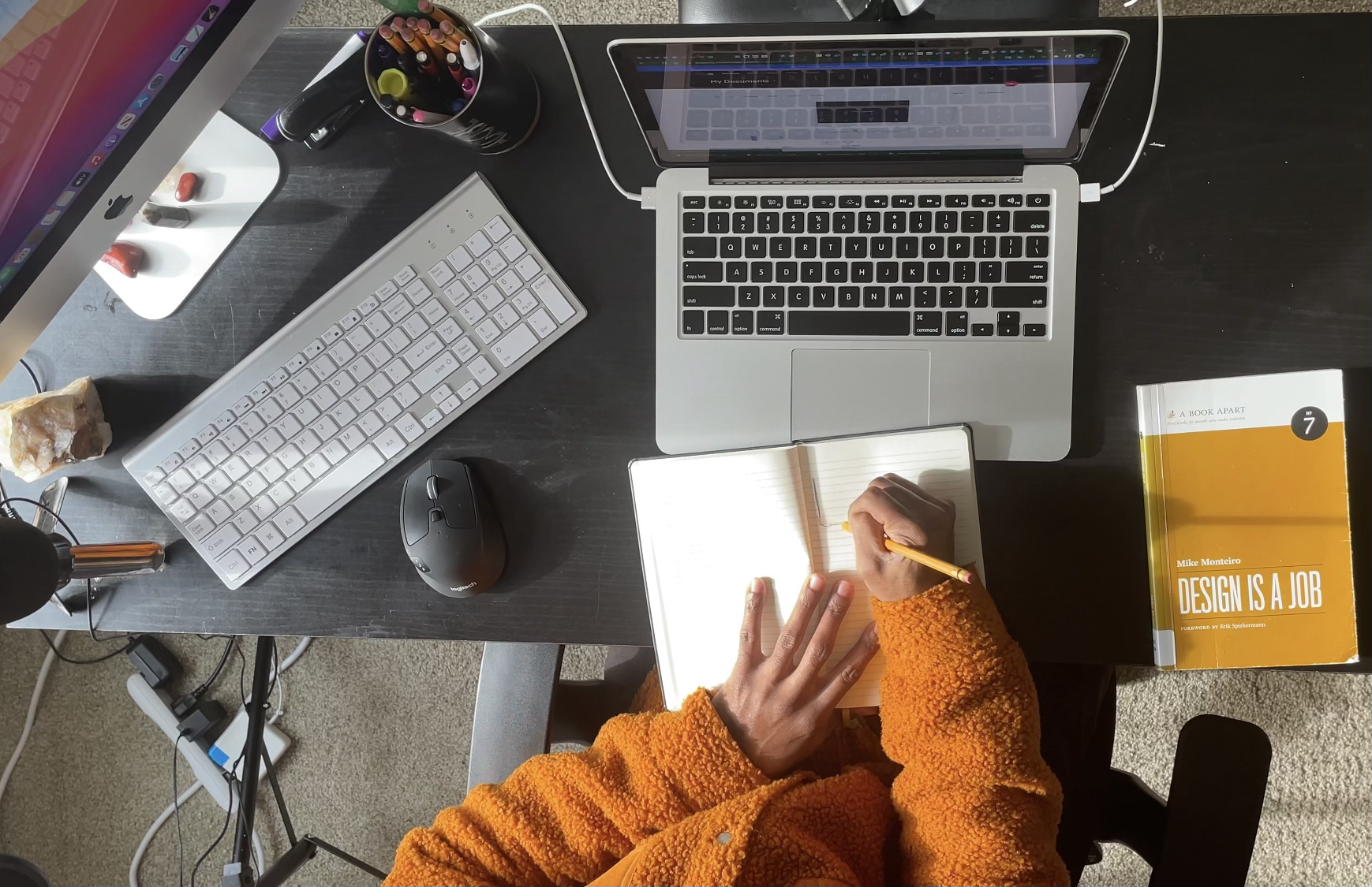 Anders brand wordmark in white placed on top of an image of a modern interior design.